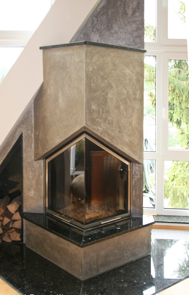 Moderne Kamine mit edler Verkleidung - Contemporary - Sunroom - Other