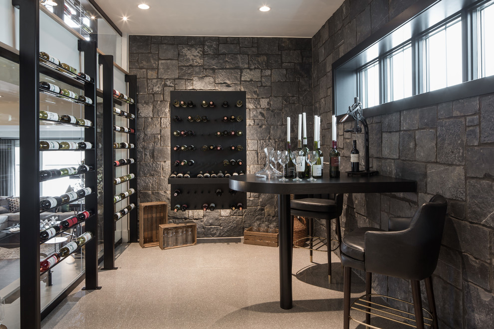 Photo of a large contemporary wine cellar in Calgary with ceramic floors, display racks and grey floor.