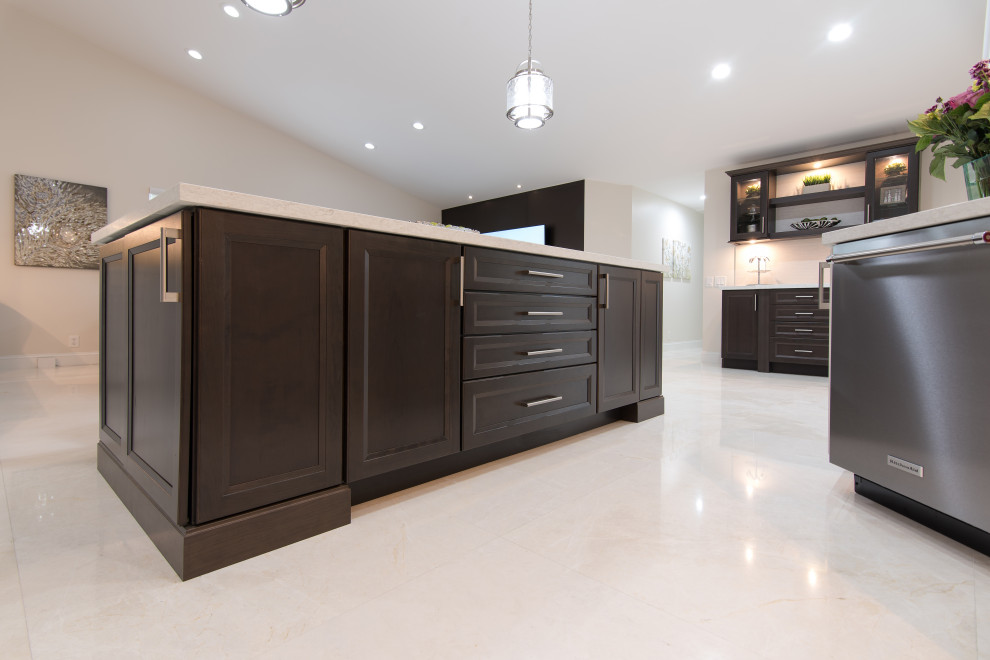 Example of a huge transitional l-shaped open concept kitchen design in Miami with an undermount sink, recessed-panel cabinets, white cabinets, quartz countertops, white backsplash, stainless steel appliances, an island and white countertops
