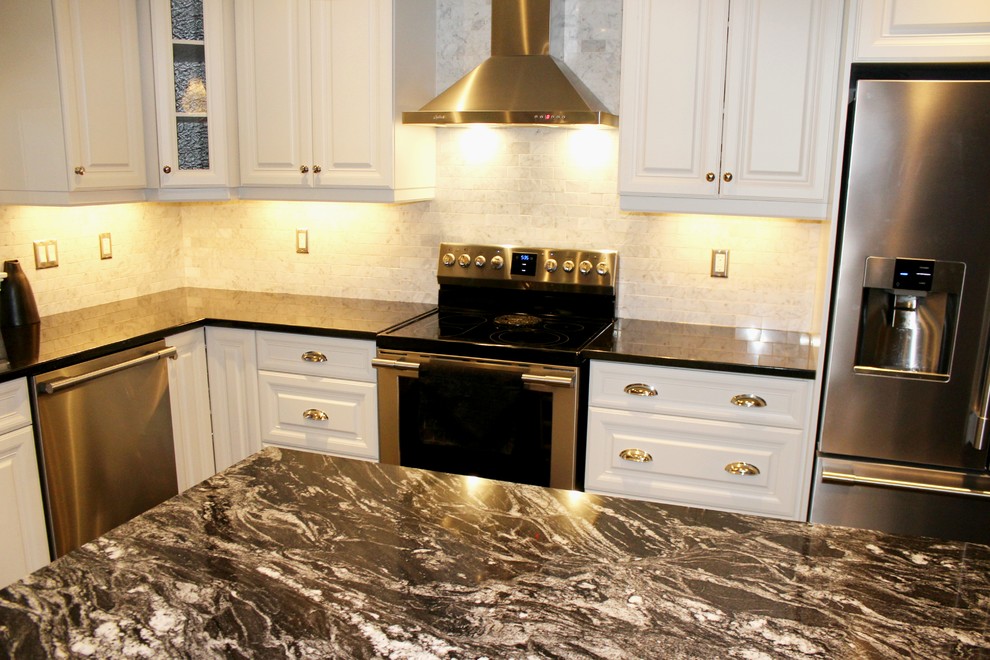 Inspiration for a mid-sized l-shaped dark wood floor open concept kitchen remodel in Toronto with an undermount sink, raised-panel cabinets, white cabinets, quartzite countertops, gray backsplash, subway tile backsplash, stainless steel appliances and an island