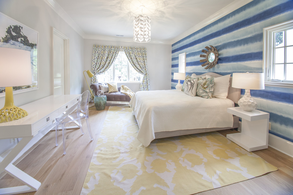 Inspiration for a transitional bedroom in Charlotte with multi-coloured walls, light hardwood floors and no fireplace.