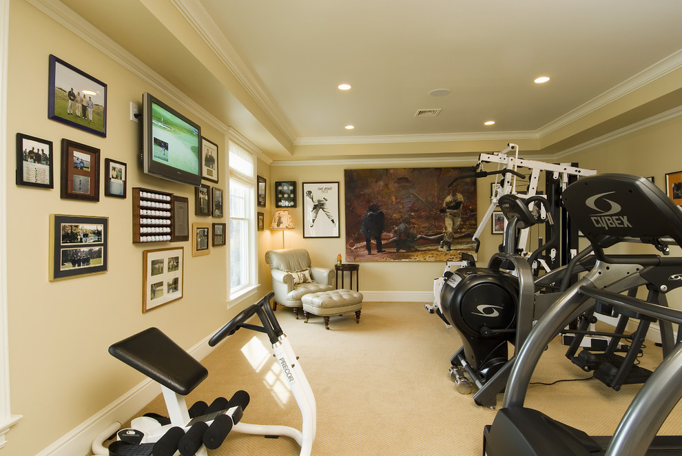 This is an example of a mid-sized traditional home gym in Bridgeport with beige walls, carpet and yellow floor.