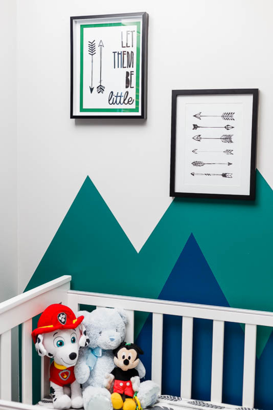 Photo of a small transitional nursery for boys in Perth with blue walls and carpet.