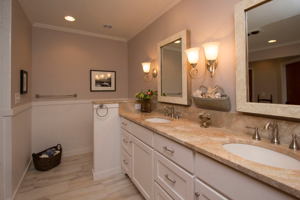 Large transitional master bathroom in Raleigh with an undermount sink, white cabinets, marble benchtops, a freestanding tub, a corner shower, a two-piece toilet, white tile, ceramic tile, beige walls, porcelain floors, shaker cabinets, multi-coloured floor, a hinged shower door and orange benchtops.