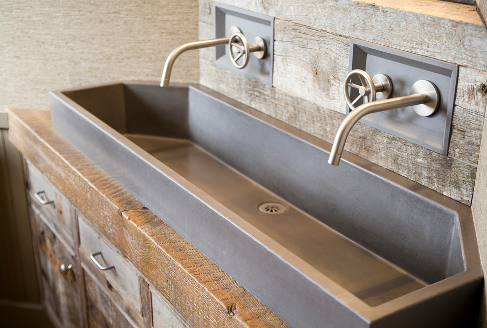 Bathroom - rustic bathroom idea with a trough sink and wood countertops