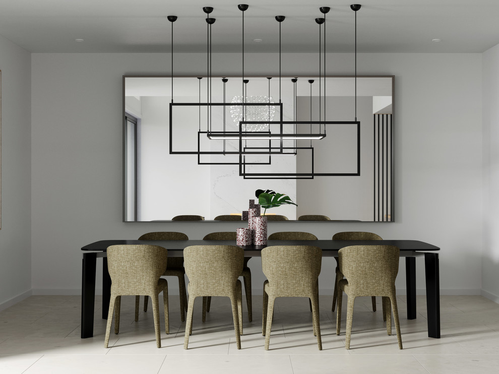 This is an example of a modern separate dining room in Brisbane with white walls and grey floor.
