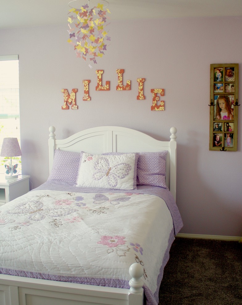 Mid-sized country kids' room in Orange County with purple walls, carpet and brown floor for girls.