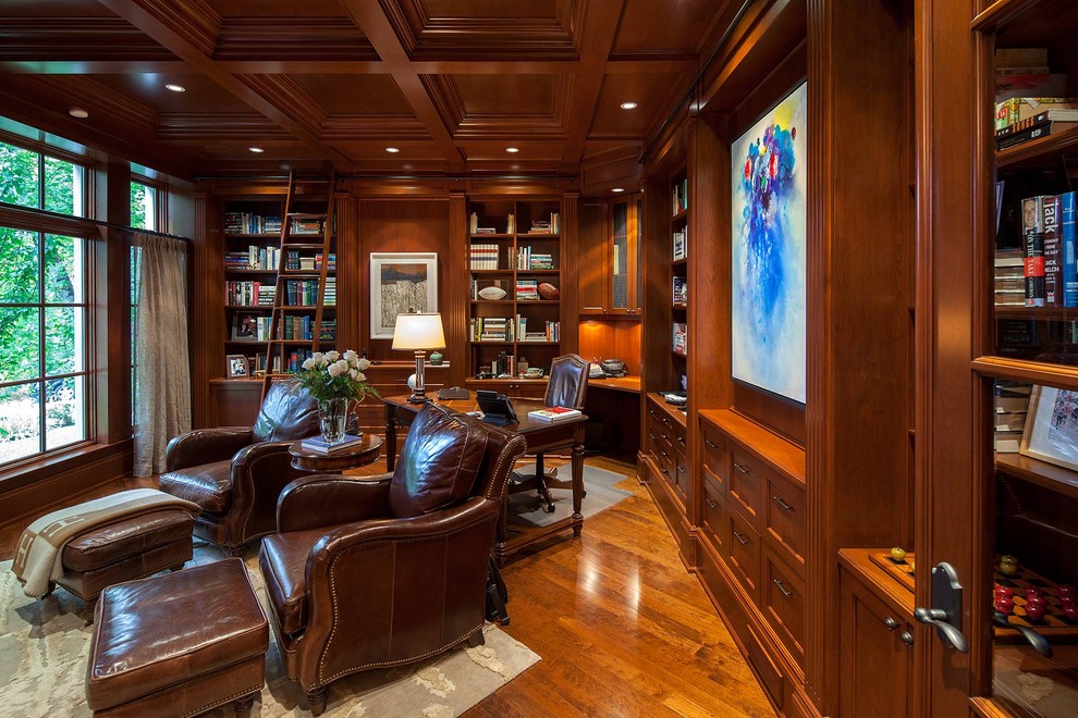 Photo of a large traditional home office in Toronto with medium hardwood floors and a freestanding desk.