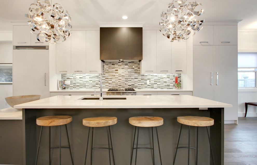 Example of a transitional kitchen design in Calgary