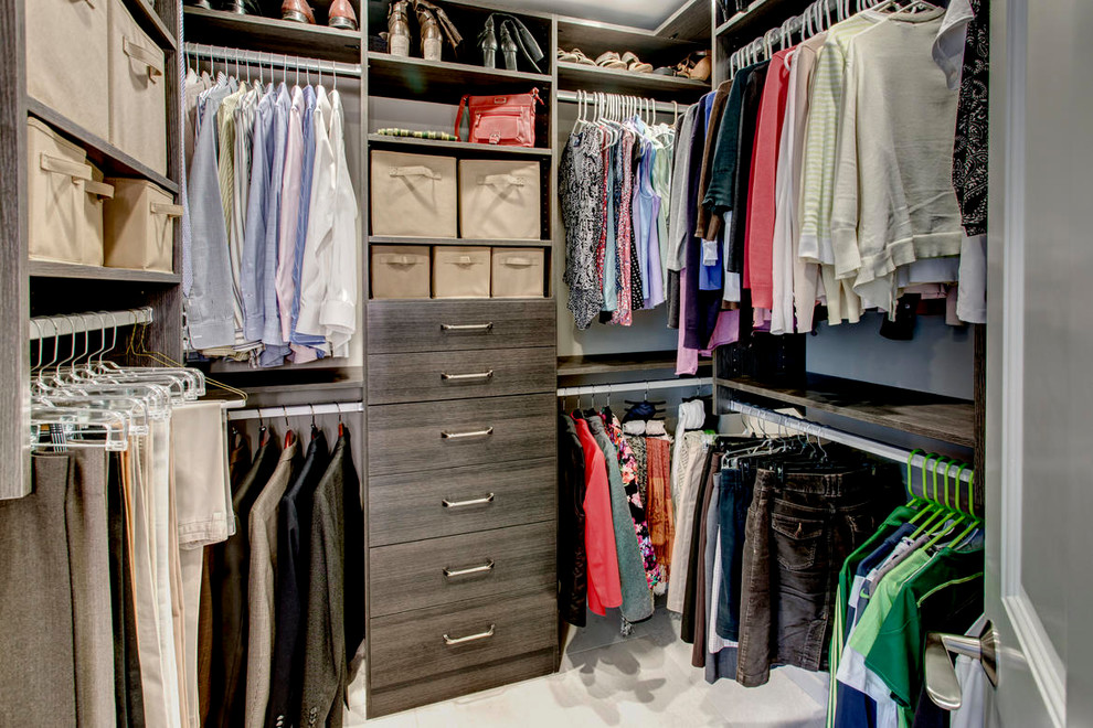 Inspiration for a large transitional gender-neutral carpeted walk-in closet remodel in Seattle with flat-panel cabinets and gray cabinets