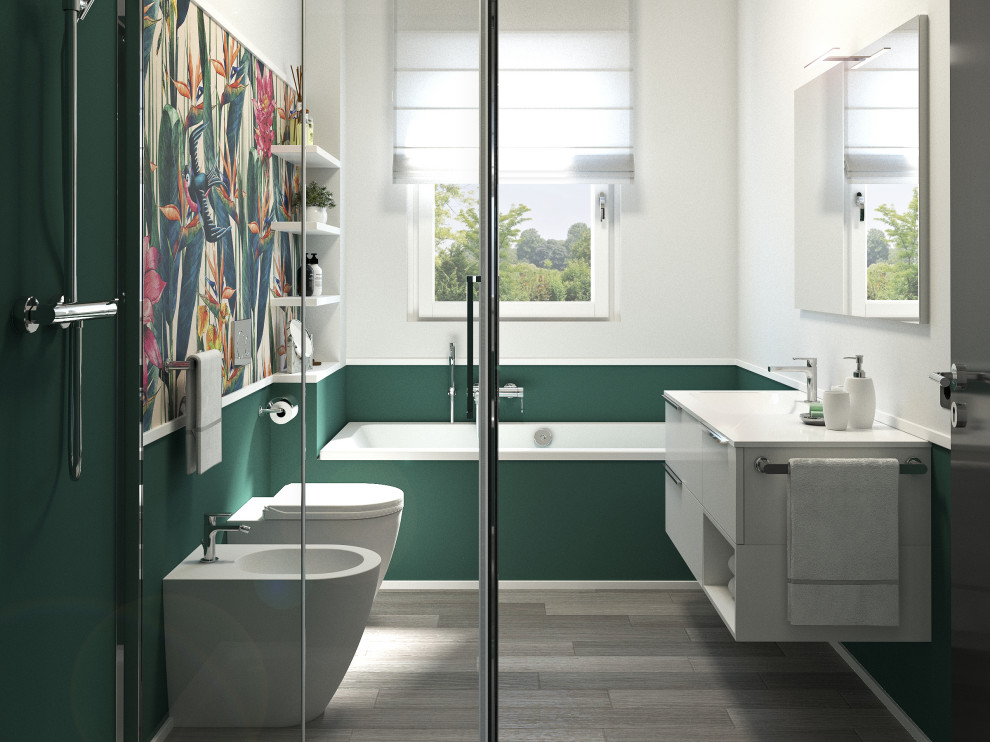 This is an example of a small 3/4 bathroom in Milan with flat-panel cabinets, white cabinets, a drop-in tub, a corner shower, a one-piece toilet, green tile, green walls, linoleum floors, a drop-in sink, engineered quartz benchtops, beige floor, a sliding shower screen, white benchtops, a single vanity, a floating vanity and wallpaper.