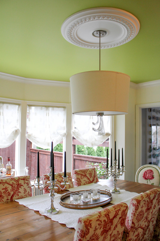 Example of a transitional dining room design in Seattle