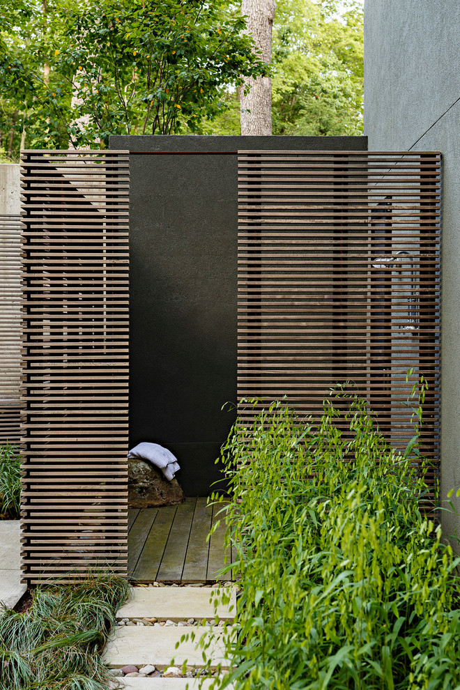 This is an example of a contemporary patio in DC Metro with an outdoor shower.