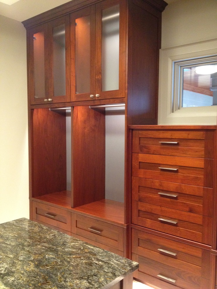 Photo of a contemporary storage and wardrobe in Charlotte.
