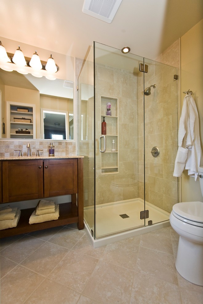 Inspiration for a small modern master bathroom in Philadelphia with an undermount sink, medium wood cabinets, a corner shower, a two-piece toilet, beige tile, ceramic tile, beige walls, ceramic floors and shaker cabinets.