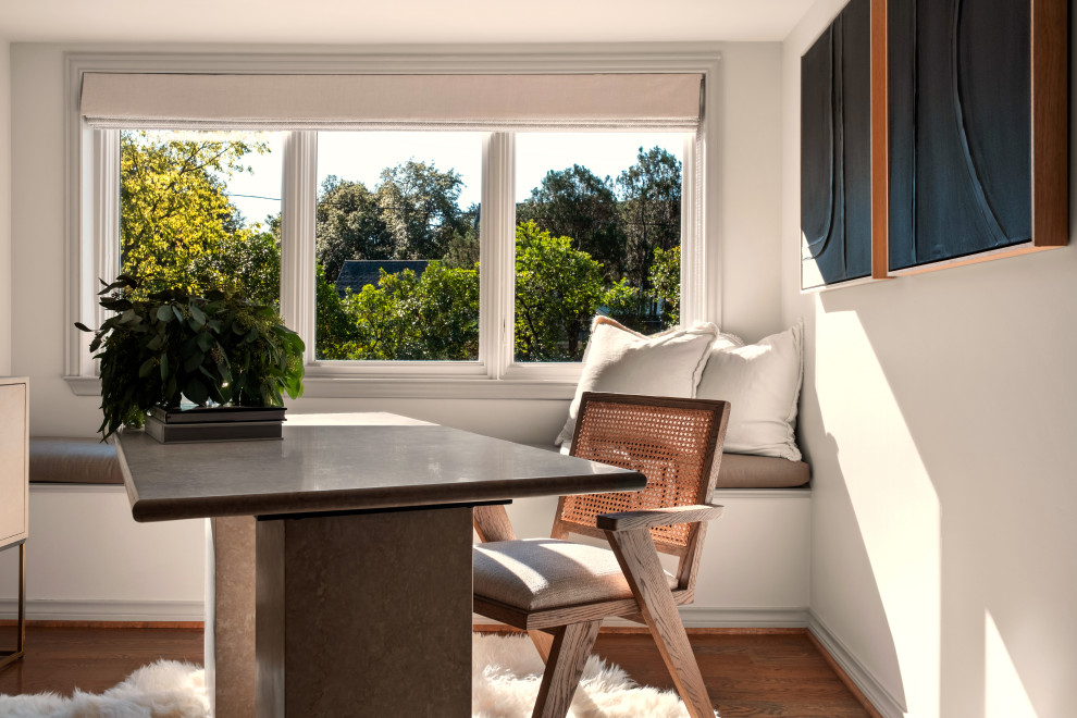 Example of a transitional dining room design in Dallas