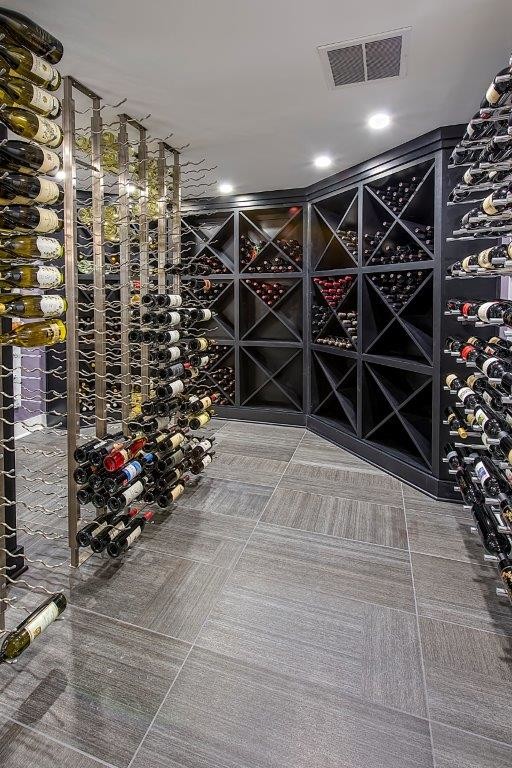 Inspiration for a large transitional wine cellar in Milwaukee with display racks.