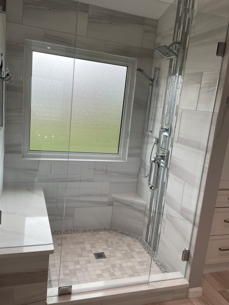Mid-sized transitional master gray tile and porcelain tile gray floor alcove shower photo in Cincinnati with gray walls and a hinged shower door