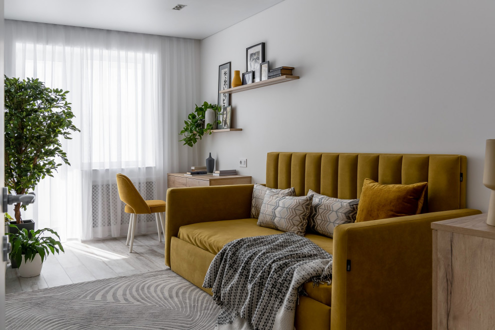 Ispirazione per una camera degli ospiti minimal di medie dimensioni con pareti bianche, pavimento in vinile, pavimento grigio e angolo studio