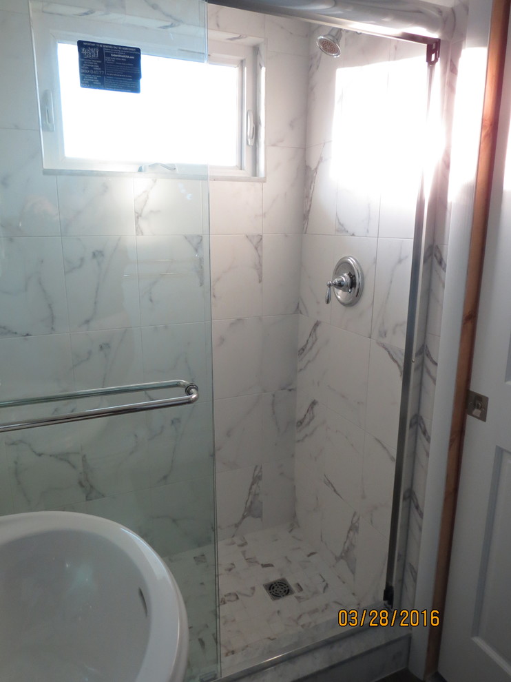 Small transitional master white tile and porcelain tile vinyl floor alcove shower photo in DC Metro with gray walls and a pedestal sink