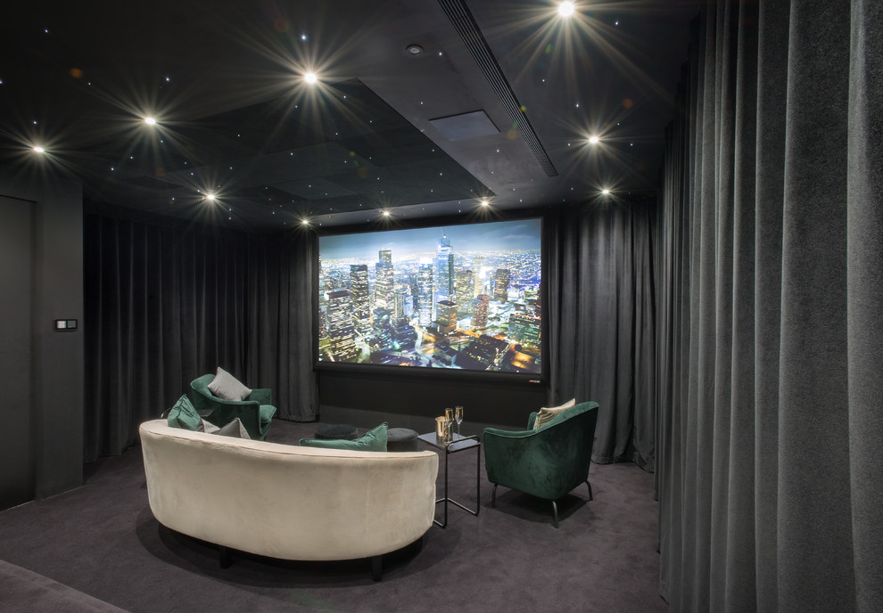 Inspiration for a contemporary enclosed home theatre in London with grey walls, carpet and grey floor.