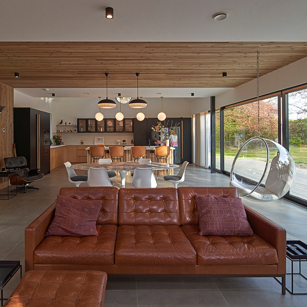 Design ideas for a medium sized contemporary grey and white open plan living room in Surrey with grey floors, a timber clad ceiling and feature lighting.