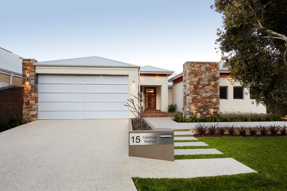 Design ideas for a large contemporary one-storey white exterior in Perth with stone veneer.