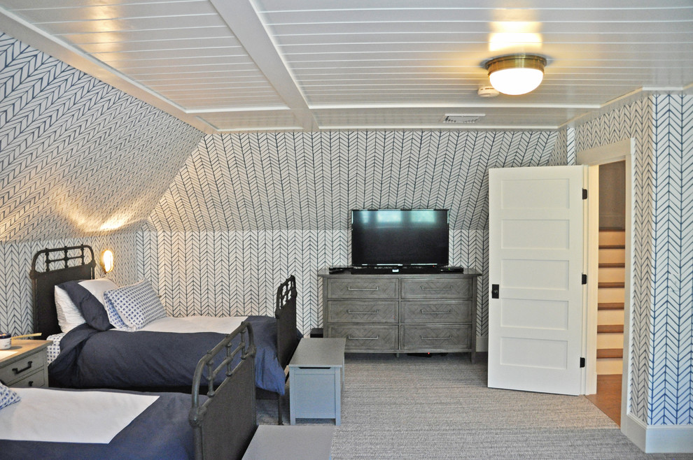 Photo of a mid-sized industrial guest bedroom in Portland Maine with blue walls, carpet, no fireplace and grey floor.
