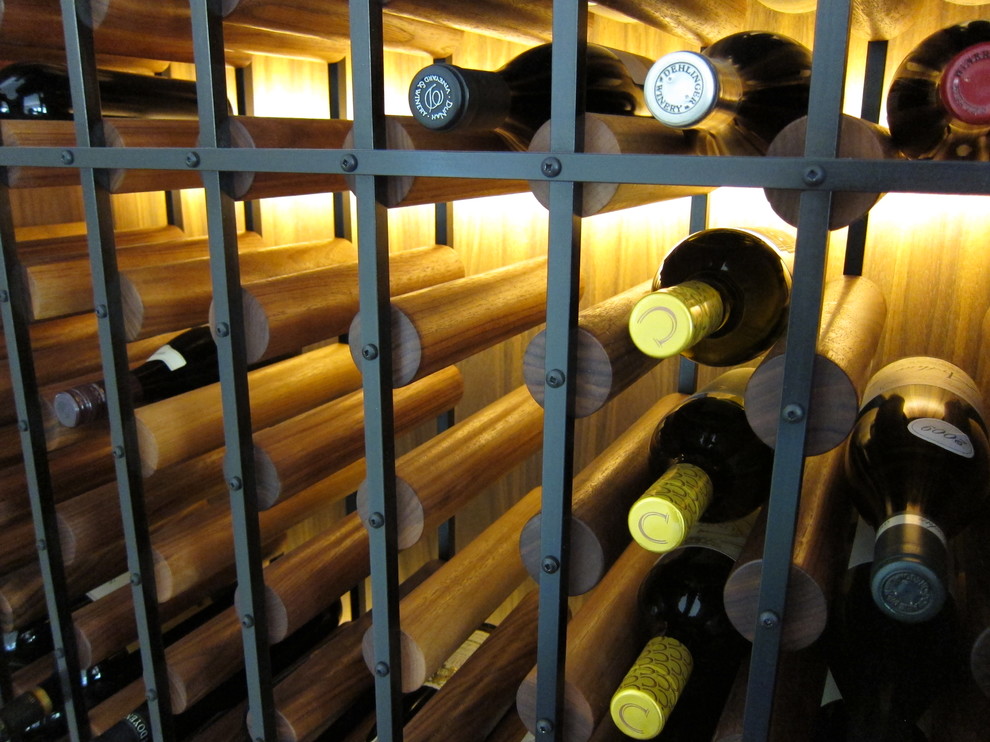 Small contemporary wine cellar in San Francisco with storage racks.