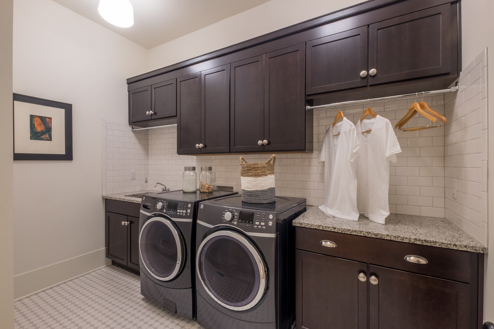 Design ideas for a transitional laundry room in Charlotte.