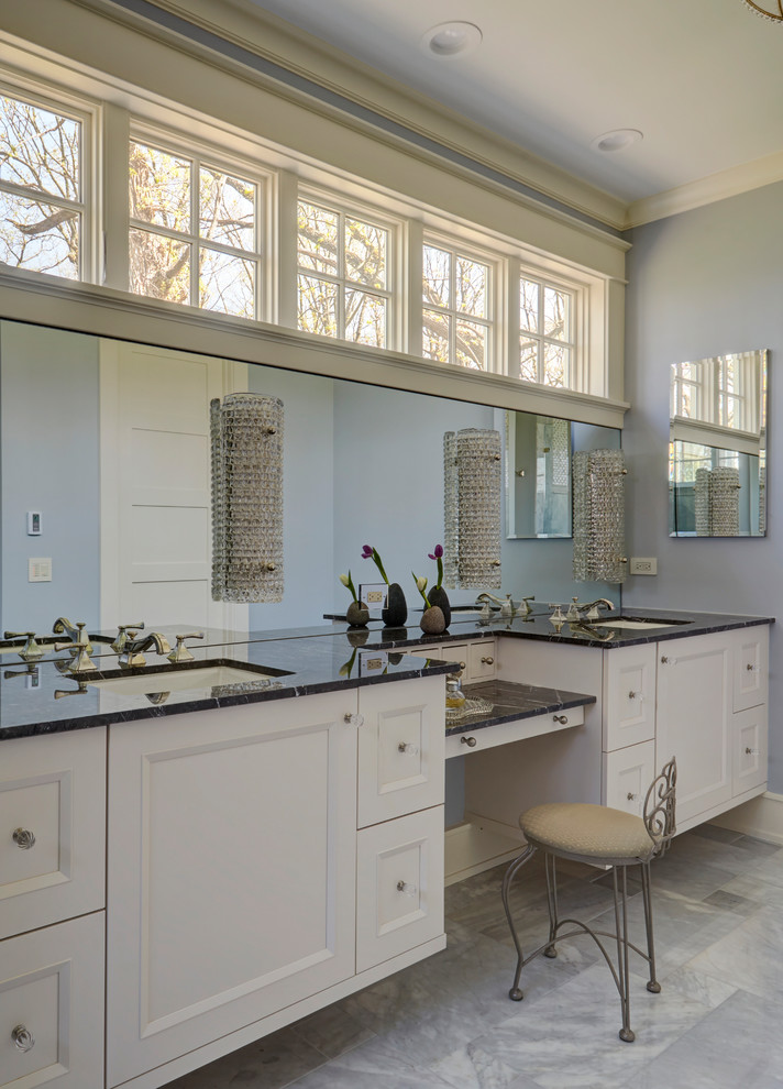 Bathroom - large traditional master marble floor and gray floor bathroom idea in Chicago with shaker cabinets, white cabinets, blue walls, an undermount sink, granite countertops and black countertops