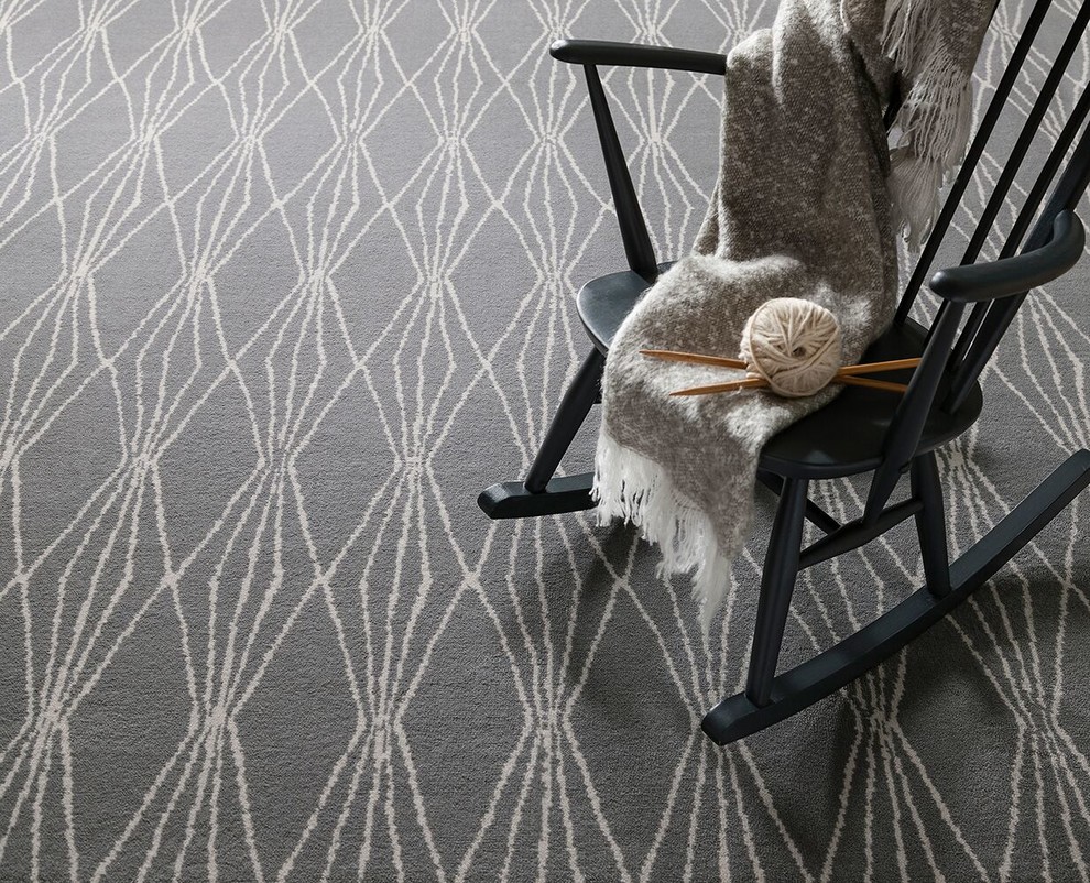 Inspiration for a contemporary living room in Manchester with carpet and grey floor.