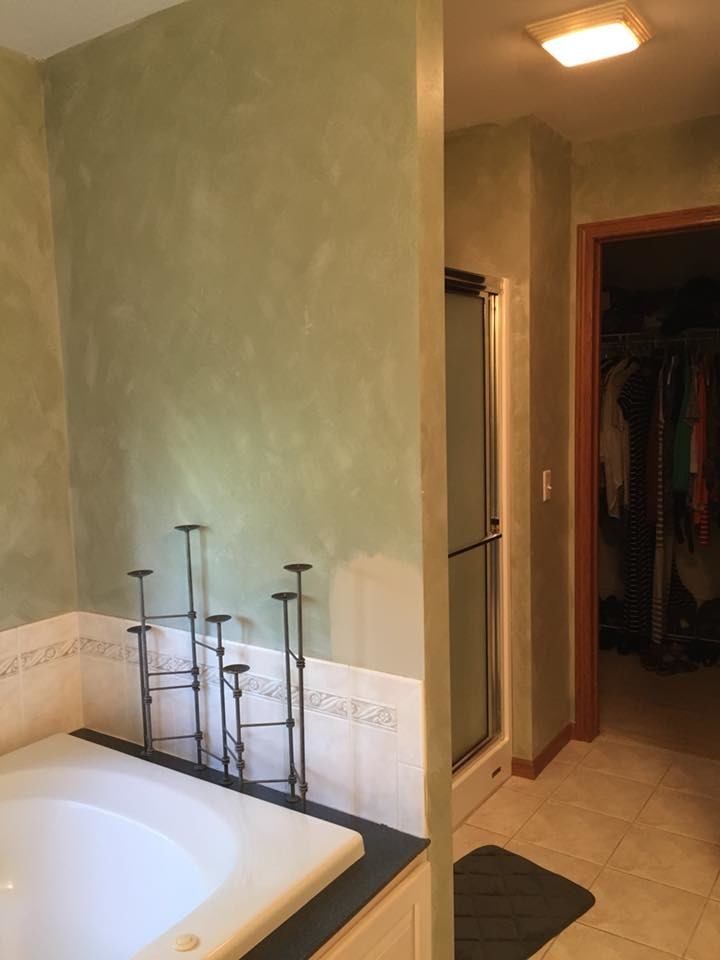 Freestanding bathtub - transitional master multicolored tile and mosaic tile porcelain tile and brown floor freestanding bathtub idea with shaker cabinets, white cabinets, a vessel sink, quartz countertops, a hinged shower door and multicolored countertops