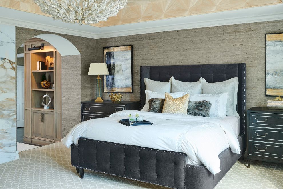 На фото: огромная хозяйская спальня в стиле неоклассика (современная классика) с ковровым покрытием, двусторонним камином, фасадом камина из плитки, многоуровневым потолком и обоями на стенах
