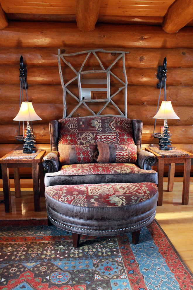 Inspiration for a large rustic light wood floor foyer remodel with a medium wood front door