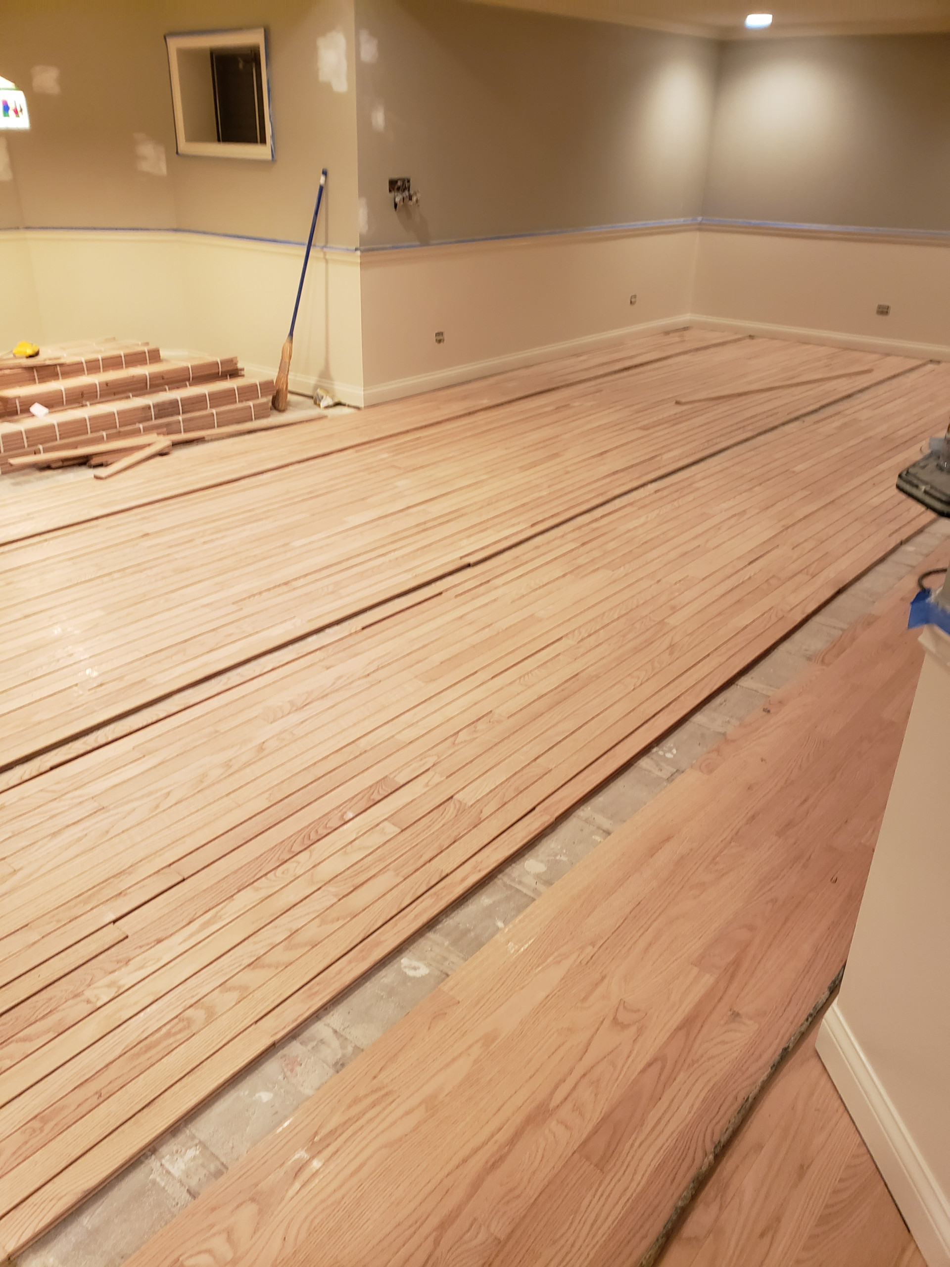 Mount Prospect,  2 and 1/4 red oak installed over radiant heat 3 coats Bona Mega