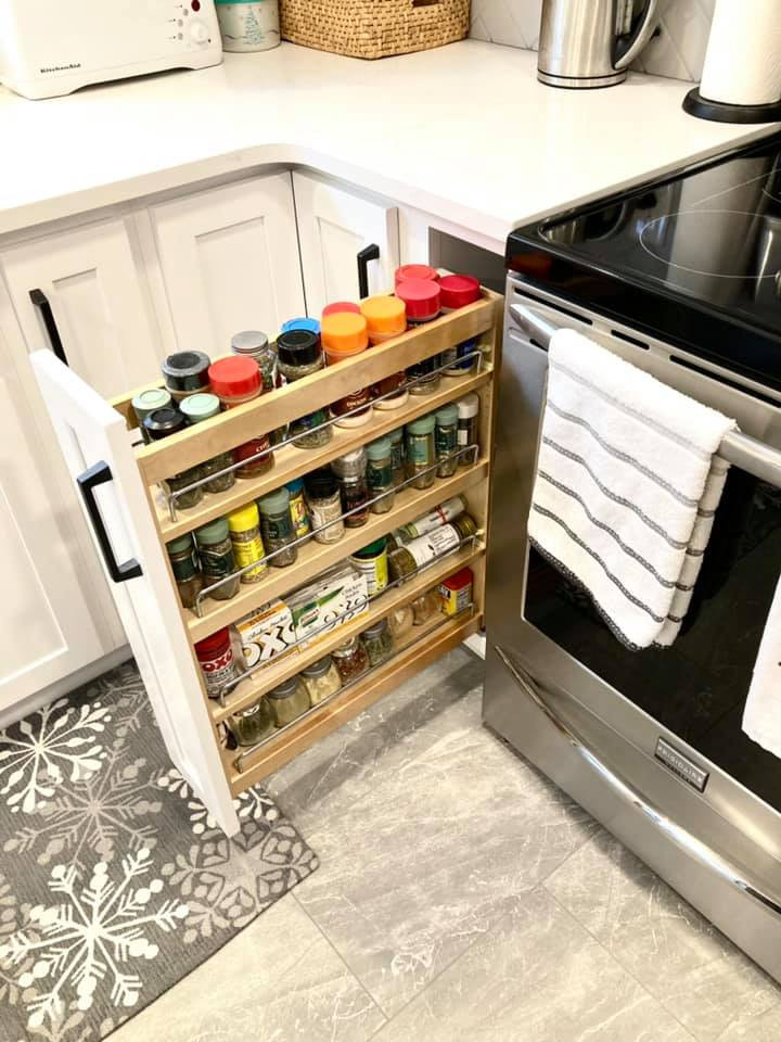 Enclosed kitchen - mid-sized transitional galley ceramic tile and gray floor enclosed kitchen idea with a double-bowl sink, shaker cabinets, white cabinets, quartz countertops, gray backsplash, ceramic backsplash, stainless steel appliances, an island and white countertops
