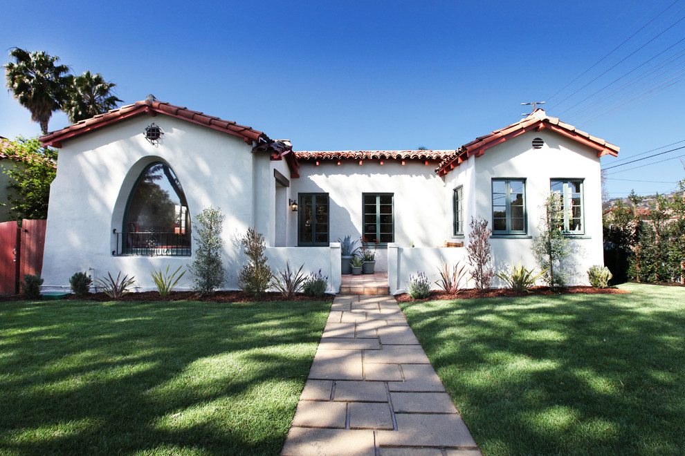 Example of a tuscan exterior home design in Los Angeles