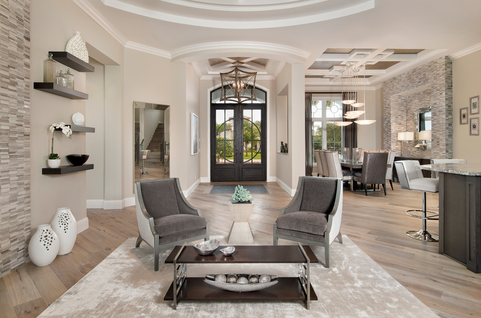 Inspiration for a transitional medium tone wood floor double front door remodel in Miami with beige walls and a dark wood front door