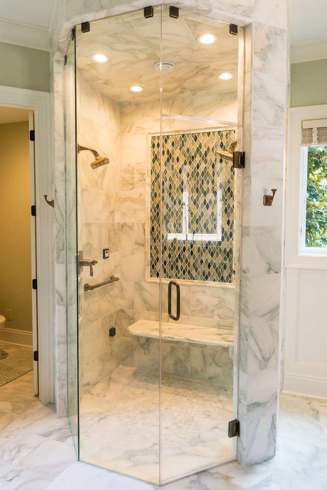 Mid-sized transitional master bathroom in Atlanta with recessed-panel cabinets, white cabinets, an undermount tub, an alcove shower, a two-piece toilet, multi-coloured tile, mosaic tile, beige walls, marble floors, an undermount sink, marble benchtops, white floor and a hinged shower door.