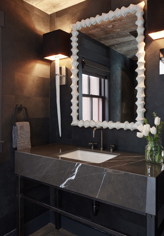 Photo of a contemporary powder room in San Francisco with an undermount sink, marble benchtops and grey benchtops.