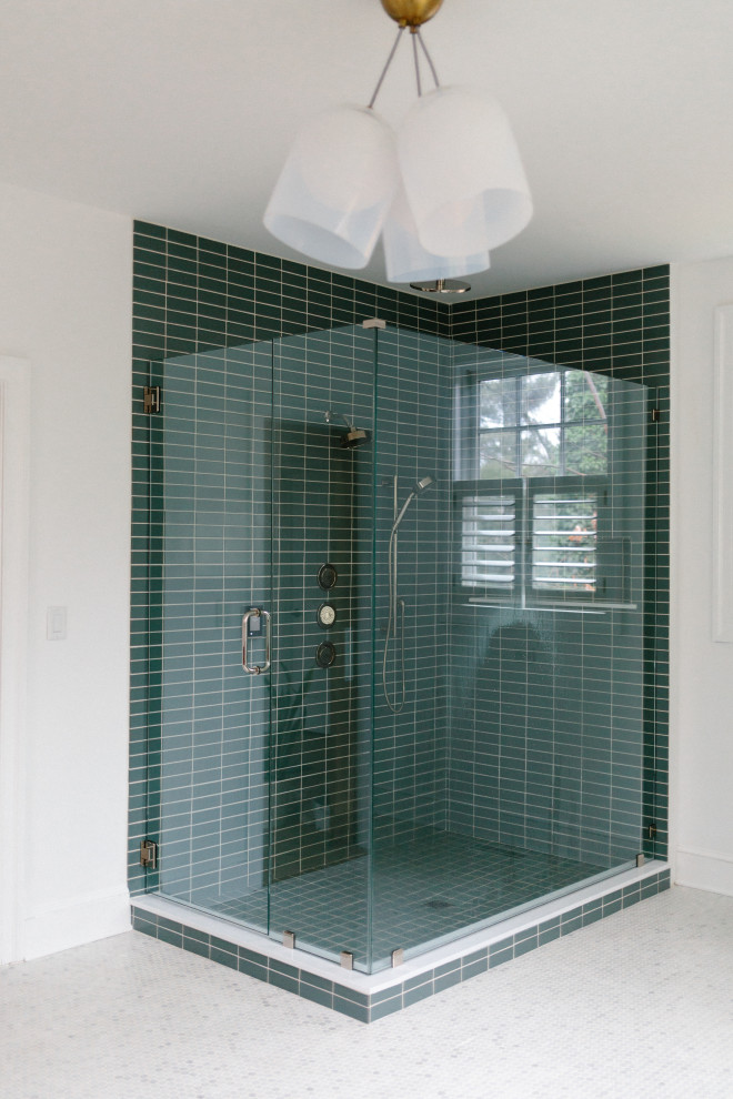 Inspiration for an expansive modern master bathroom in Philadelphia with medium wood cabinets, a freestanding tub, a corner shower, green tile, ceramic tile, white walls, ceramic floors, green floor, a hinged shower door and a niche.