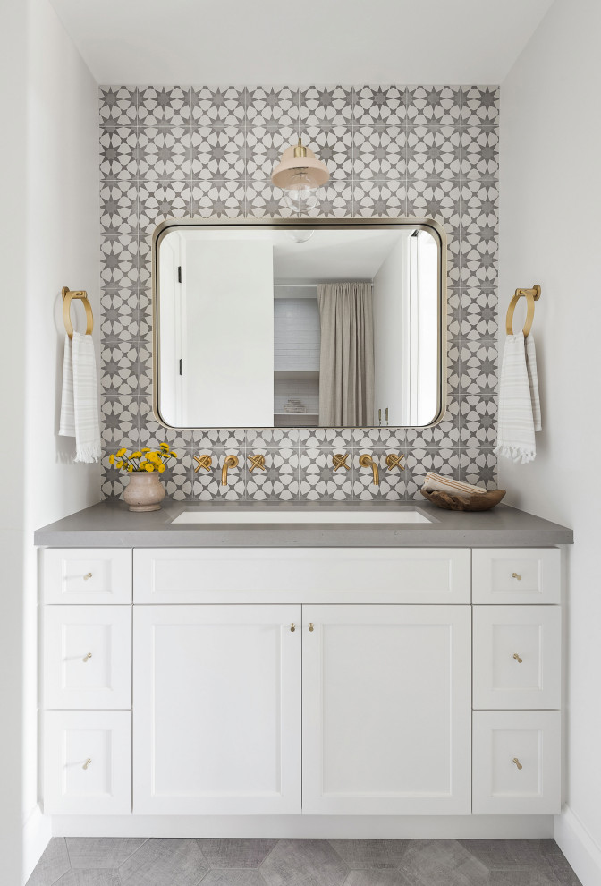 Photo of a mid-sized country kids bathroom in San Diego with shaker cabinets, white cabinets, ceramic tile, white walls, porcelain floors, a trough sink, engineered quartz benchtops, grey floor, grey benchtops, multi-coloured tile, a double vanity and a built-in vanity.