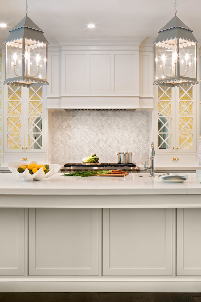 Inspiration for a large traditional u-shaped eat-in kitchen in Jacksonville with a farmhouse sink, beaded inset cabinets, white cabinets, stainless steel appliances, dark hardwood floors, with island and white benchtop.