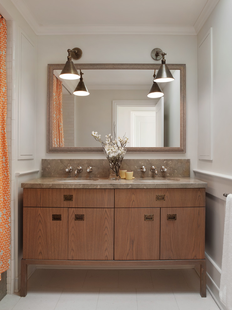 Photo of a transitional bathroom in San Francisco with an undermount sink, medium wood cabinets, white walls, a shower curtain, brown benchtops and flat-panel cabinets.