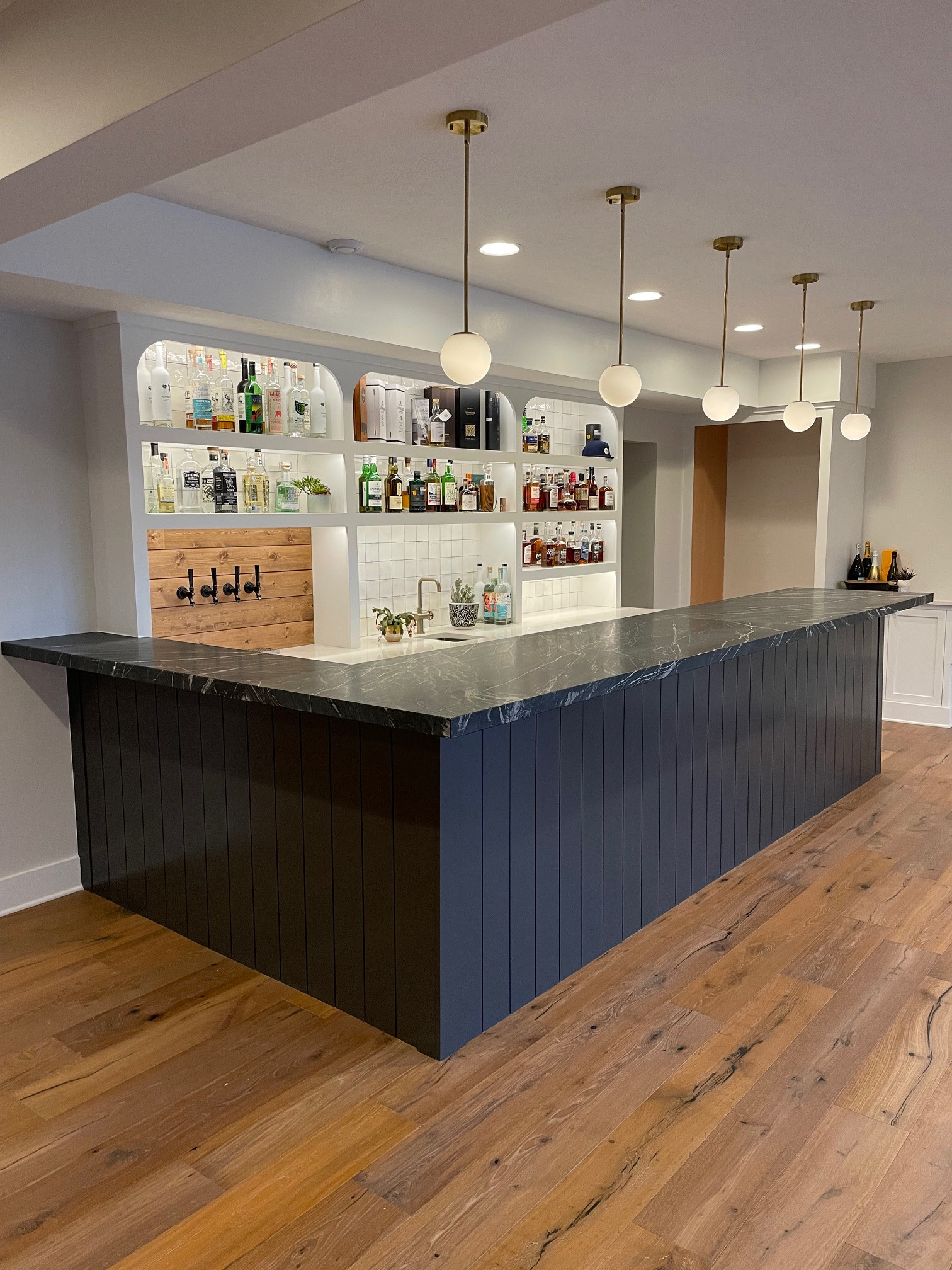 Finished Basement in Marshall Township With Custom Bar and Beer Tap