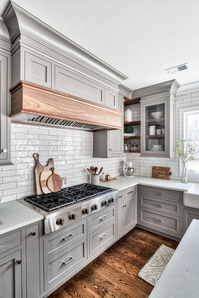 Inspiration for a transitional kitchen in New York with porcelain splashback.