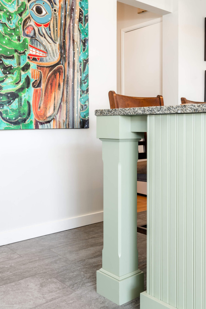 Inspiration for a mid-sized transitional galley eat-in kitchen remodel with shaker cabinets and an island