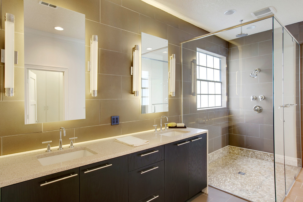 Photo of a transitional bathroom in Orlando with flat-panel cabinets.