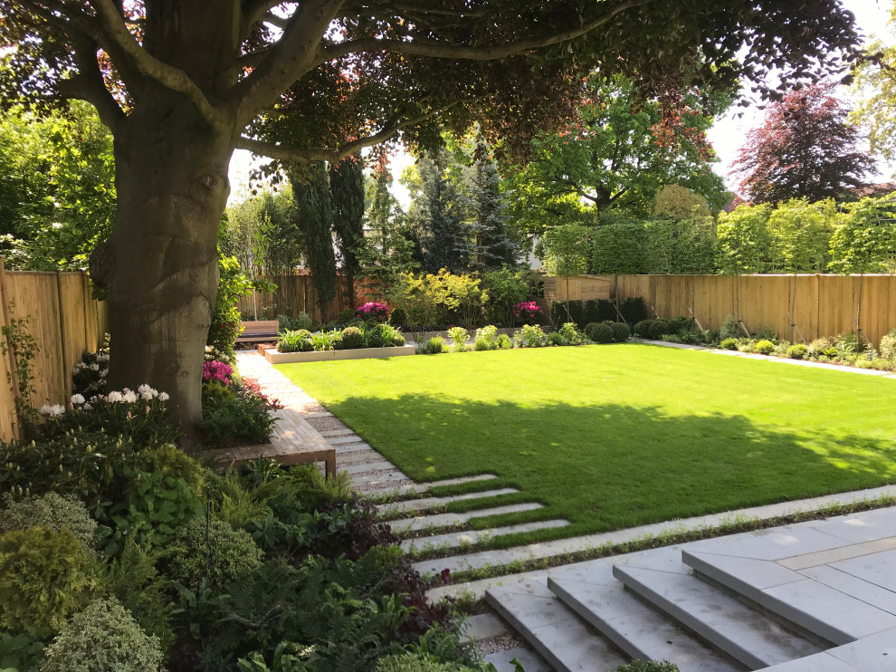 Design ideas for a large contemporary backyard formal garden in London.
